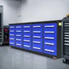 10ft 25-Drawer Storage Workbench with Wheels 35 a 10ft blue garage cabinet in a basement